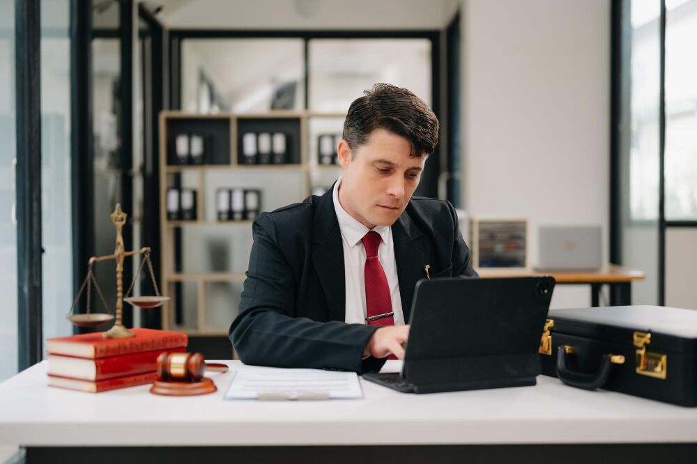 UK notary public verifying legal documents at a desk